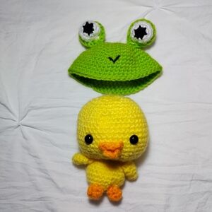 Crochet duck with frog hat